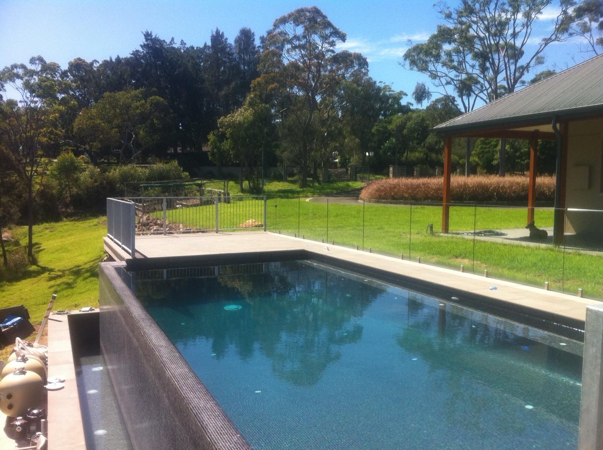 Every tile is a brushstroke in the masterpiece of your dream pool. Our commitment to precision and design excellence ensures that each project we undertake is both visually captivating and built to last. Trust us to turn your backyard into a luxurious getaway, one tile at a time