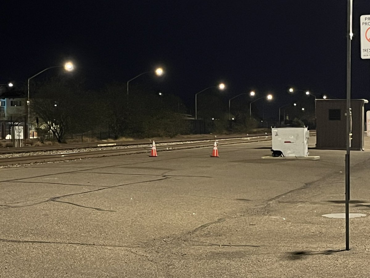 This black cat is a foamer:
It knows its train time in Tucson…