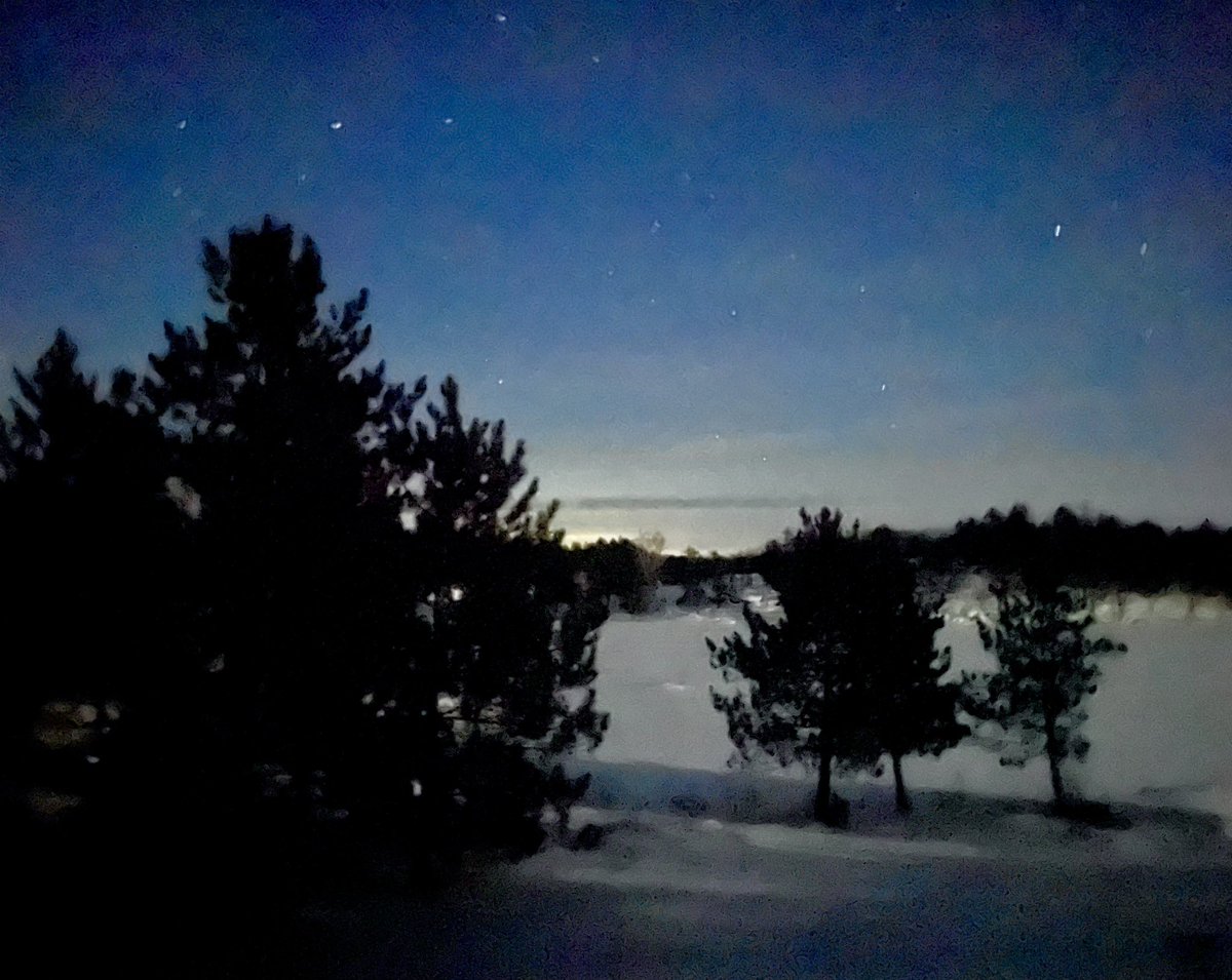 Tonight is cold but beautiful. The frozen wilderness waits for the sun as the temperature falls. Thankfully, there is hot chocolate and a crackling fire indoors! #winterwilderness #Canadianwinter #camplife