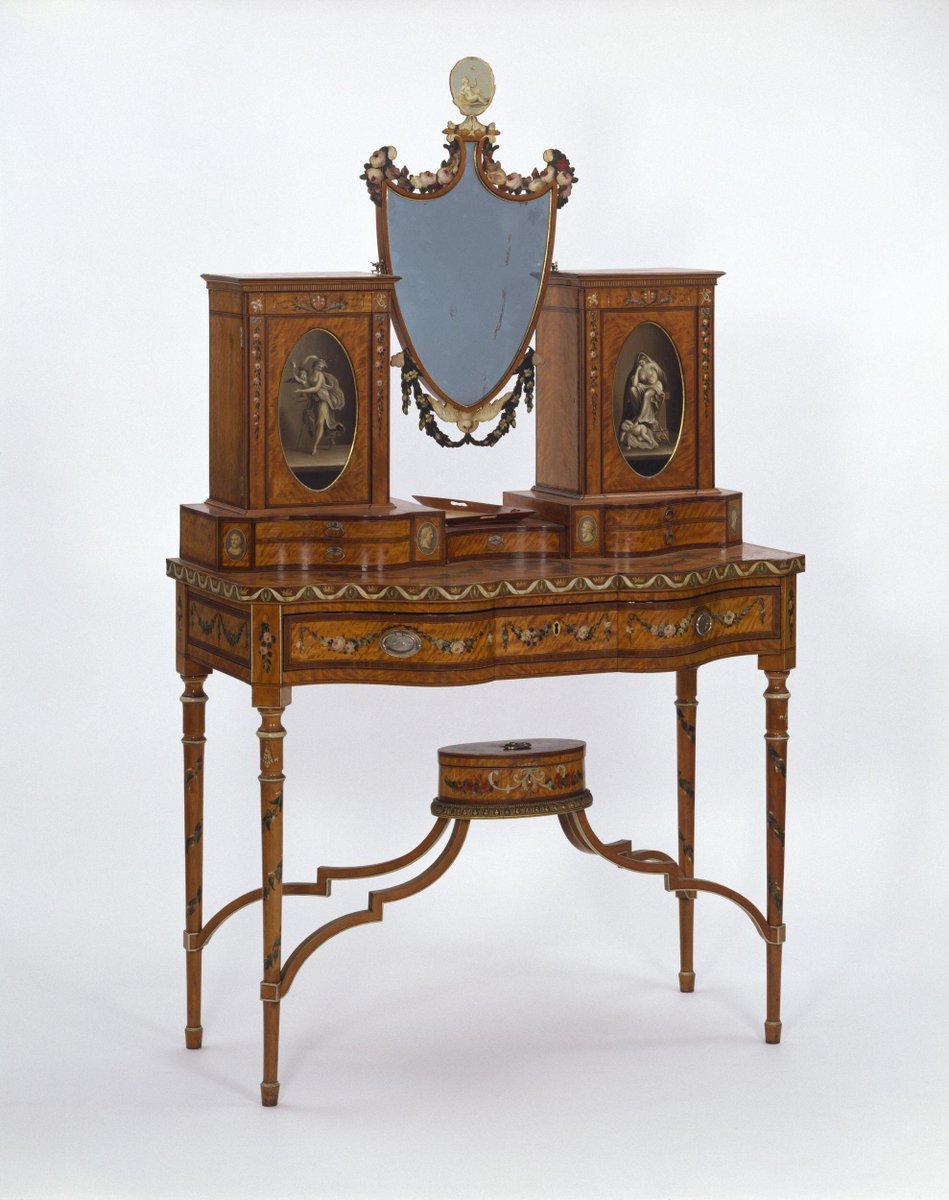 Dressing table of painted satinwood, with Sheffield plate handles, 1825-35. Victoria &amp; Albert Museum.