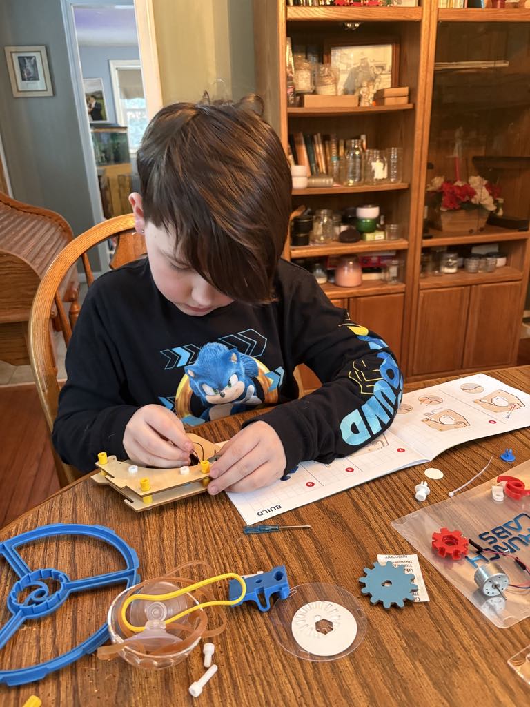 aboyandhisdogjh's tweet image. Jordan’s favorite Crunch Lab creation to date? A Dynamo Disco Ball! 🪩⚡ Imagine Blu and D.O.G. turning any room into a high-energy dance party—because science should be FUN! What would you invent? #RainingRobots #CrunchLab #STEMkids