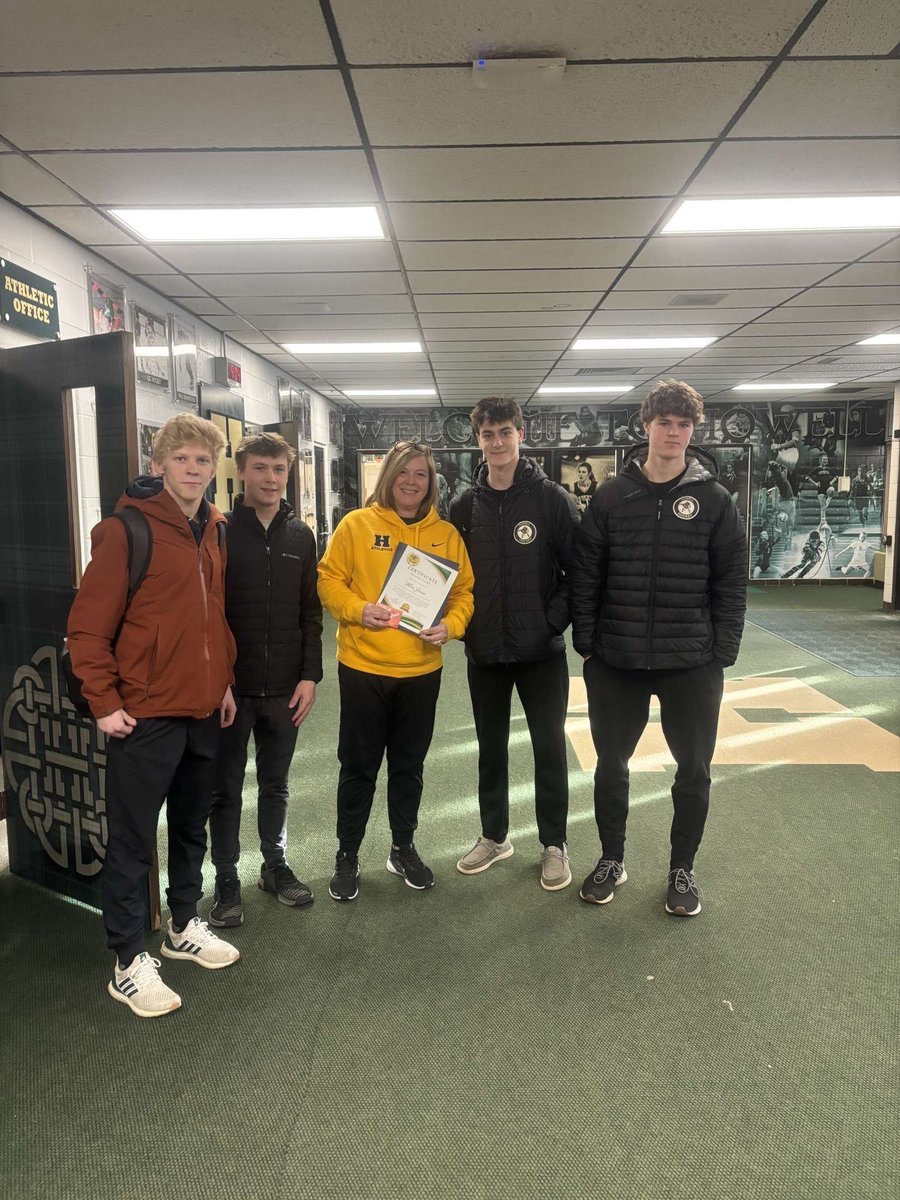 Captains Marco Wolf and Chad Pietila and Ast Captains Rory Sturos and Luke Storm.  If you’ve ever stopped by the athletic office you know how important she is. We couldn’t do it without you. Mrs. Jones thank you for everything you do. <a href="/HowellMISchools/">Howell Schools</a> #OneHowell