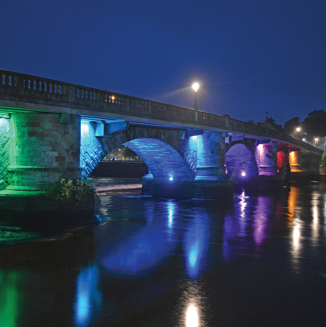ColorKinetics's tweet photo. Have you seen #ColorKinetics illumination of the iconic Dumbarton Bridge⁉️Color Kinetics luminaires bring new life to the historic bridge in Dumbarton, Wales. The bright colors reflect on the Leven River below, creating a dramatic, eye-catching effect for all to enjoy 🌈✨ https://t.co/DeTII1v0uw