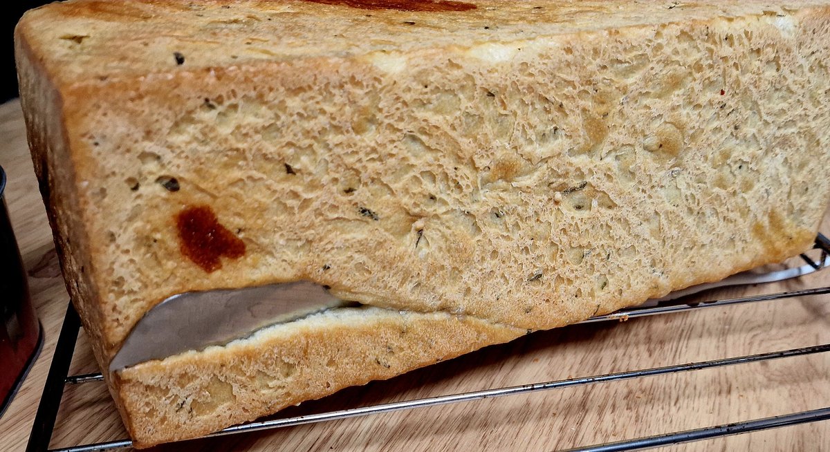 StephODoc's tweet photo. Away for the week and decided on baking a cheese and basil loaf (again!) Got very excited taking it out of the oven, only to discover I had forgotten to take my bread knife out of my pullman tin first 🙈 #oops #bakingfail #breadbaking https://t.co/MOQ3L7h9CV