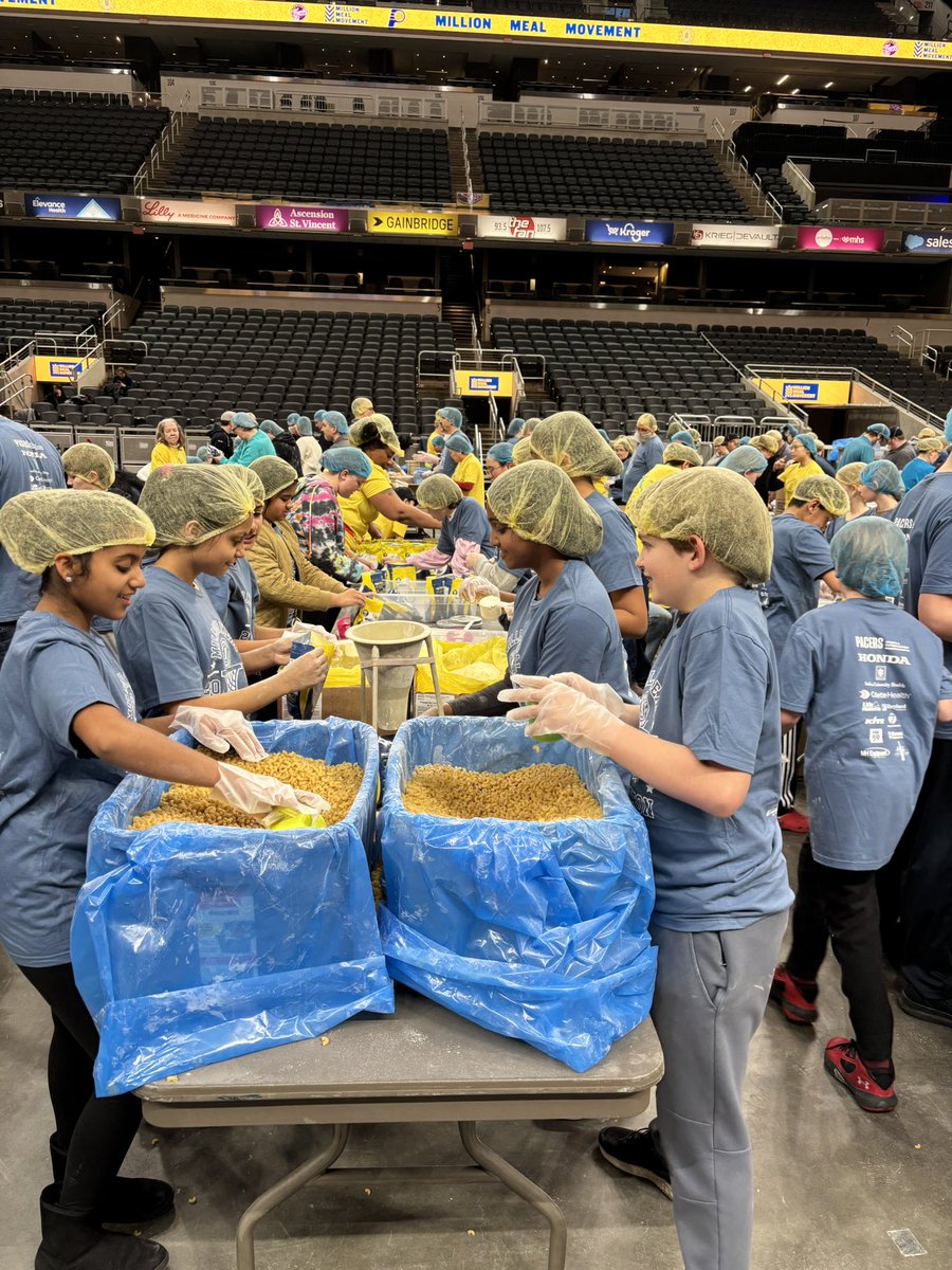 _CoachHill11's tweet photo. Watch out!! Panthers in the house helping to pack food for the Million Meal Marathon. Building life-long humanitarians!  @MMealMovement @HJHPanthers @MrsORourkeHIJH https://t.co/1zjXkH12UL