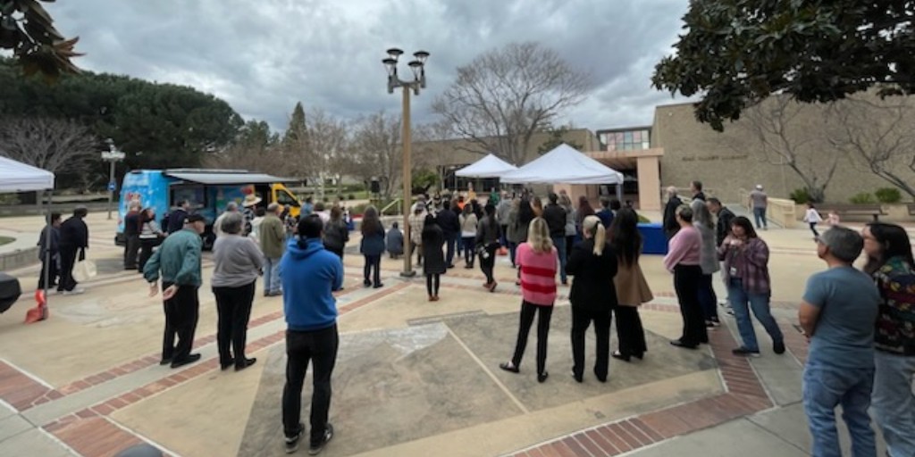 ✨ Exciting News! 🎉 On February 4th, we celebrated the launch of our new mobile library, Library on the Go! 🚐💨 Local leaders and community members came together to cut the ribbon and explore our new mobile library, packed with books, laptops, and learning kits!