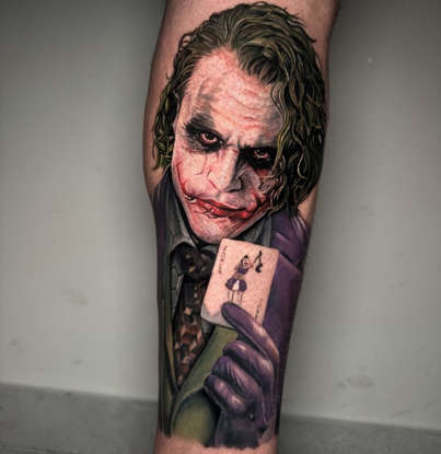 ImNotL1on's tweet photo. Just got this new tattoo! i got it to show my dedication to my boss, safe to say I'm officially part of the squad! #goon4life #bestgoon #goonlife #gansta #tattoo #bazinga #switch2 #ilovemywife #gotham #ihatebatman #screwthejusticeleague #quagmire #cleveland #homersimps @RealJoker https://t.co/cROQD6mZOt