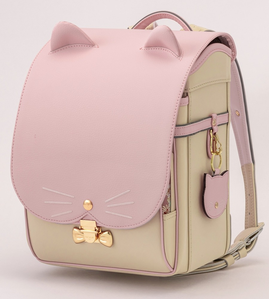 fashionpressnet's tweet photo. ポール &amp; ジョー「ネコ耳」飛び出すランドセル、“リボン型”金具＆猫チャーム付き - https://t.co/agbKbtaX3V https://t.co/I9OFTWIjq5