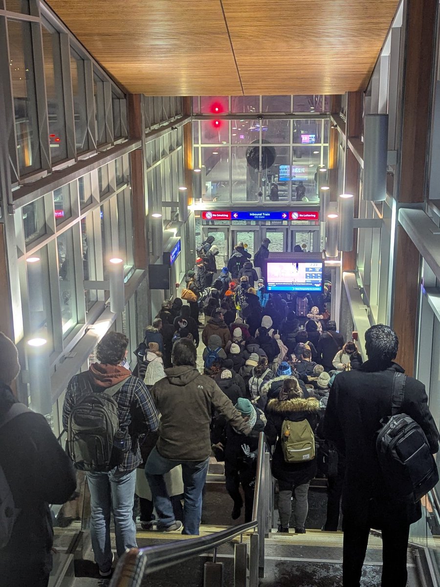 CalgaryFail's tweet photo. @calgarytransit It can't get much fuller. 
There are literally over 200 people here waiting https://t.co/UA68azypaO