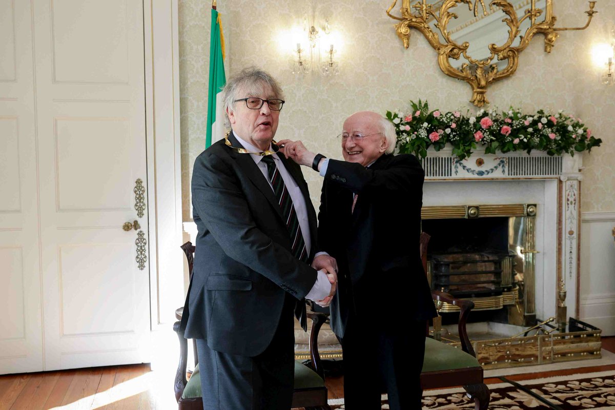 PresidentIRL's tweet image. President Michael D. Higgins this morning conferred the honour of Saoi of Aosdána on the poet Paul Muldoon at a ceremony at Áras an Uachtaráin. The President presented Paul with the symbol of the office of Saoi, the gold Torc. Read more at president.ie/en/media-libra…