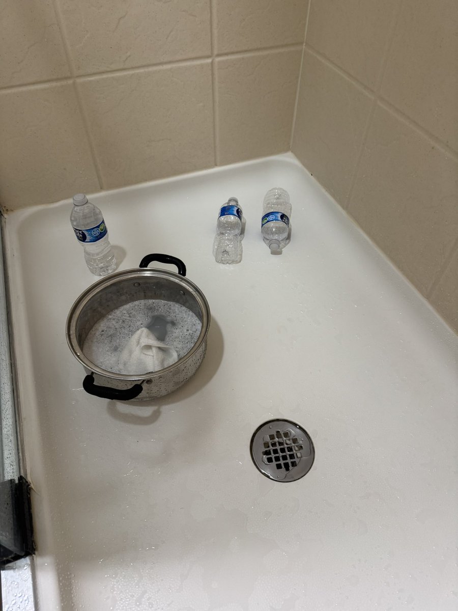 klinger33's tweet photo. @HomewoodSuites this is how you shower at the Homewood Suites in Rockville, MD. Twelve nights, at least 48 hours with no water (still counting), multiple people stuck in elevators (one elevator not working), pipes bursting, and industrial fans in your room for three days. Luxury! https://t.co/m8mlNdS1bD