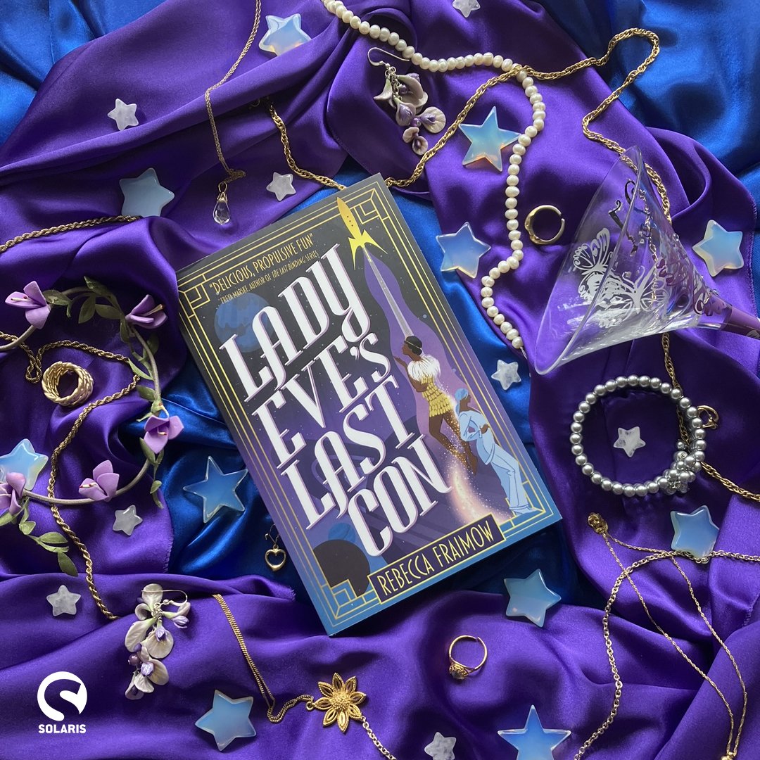 Solaris Books (@solarisbooks) on Twitter photo Did you know that <a href="/ryfkah/">Rebecca Fraimow</a>'s LADY EVE'S LAST CON was one of <a href="/nytimes/">The New York Times</a>' Best Romance Novels of 2024?
"Ingenious, heart-warming and hilarious" <a href="/zenaldehyde/">Zen Cho</a>
"Delicious, propulsive fun." - Freya Marske
"(A) charming, space-hopping, queer rom-com" <a href="/voidcricket/">Ren Hutchings</a>
geni.us/5unVd Did you know that <a href="/ryfkah/">Rebecca Fraimow</a>'s LADY EVE'S LAST CON was one of <a href="/nytimes/">The New York Times</a>' Best Romance Novels of 2024?
"Ingenious, heart-warming and hilarious" <a href="/zenaldehyde/">Zen Cho</a>
"Delicious, propulsive fun." - Freya Marske
"(A) charming, space-hopping, queer rom-com" <a href="/voidcricket/">Ren Hutchings</a>
geni.us/5unVd