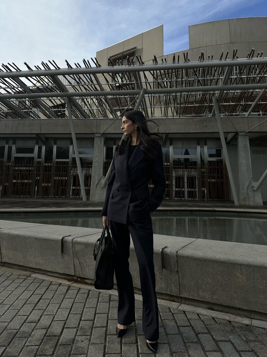 Today a man told me that I’m not truly traumatised by being raped because I’m career-focused and into fashion. I hear it constantly: “you don’t look like a victim”. So just to annoy them even more, here’s a picture of me taken yesterday outside parliament looking extra confident.