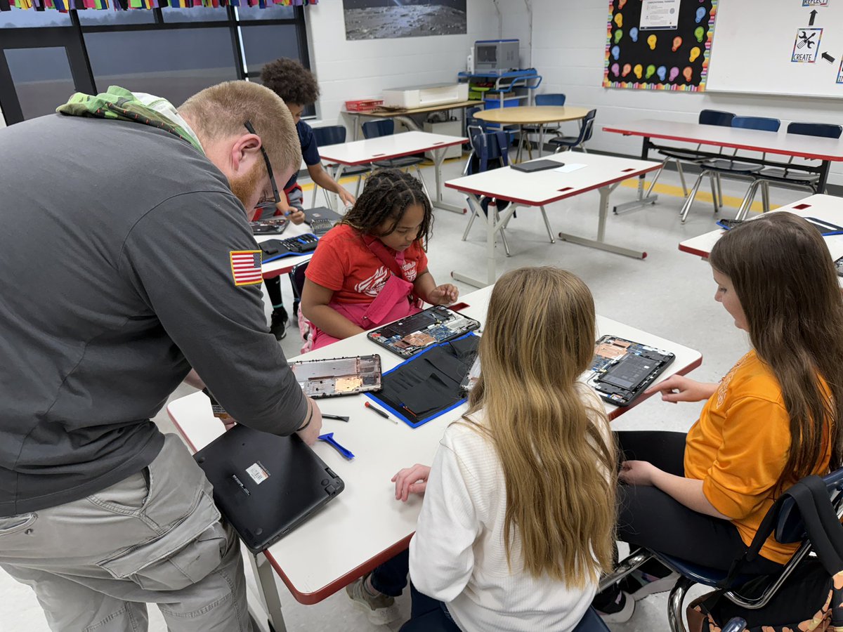 TechnologyBCS's tweet image. Students at @WCES_Cherokees working with @TechnologyBCS Technicians learning about Chromebook repair. @WCES_Cherokees is creating a student led technology team to assist Chromebooks at the school. #InnovativeEducation