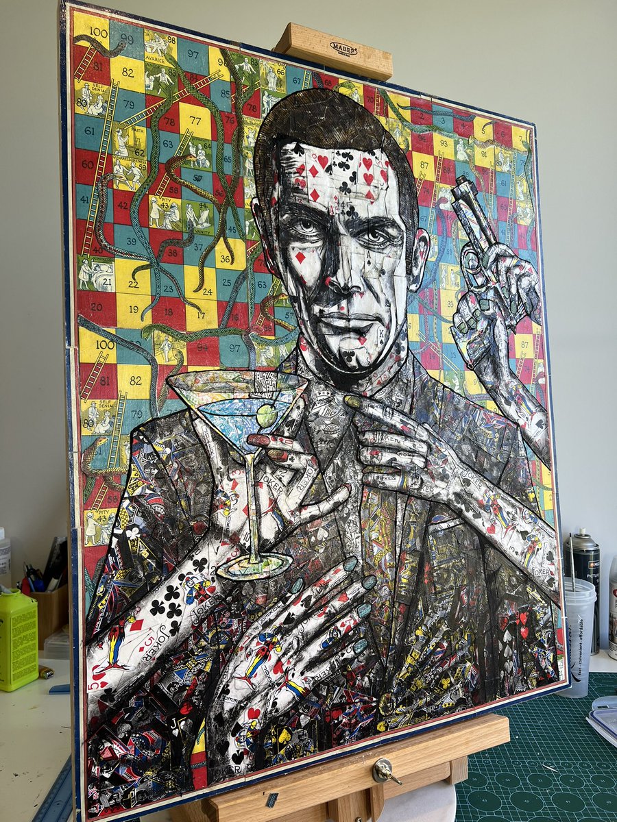 elmoHood's tweet photo. Mixed media painting of James Bond made from playing cards and snakes &amp; ladders boards https://t.co/vjoKWgHXDY