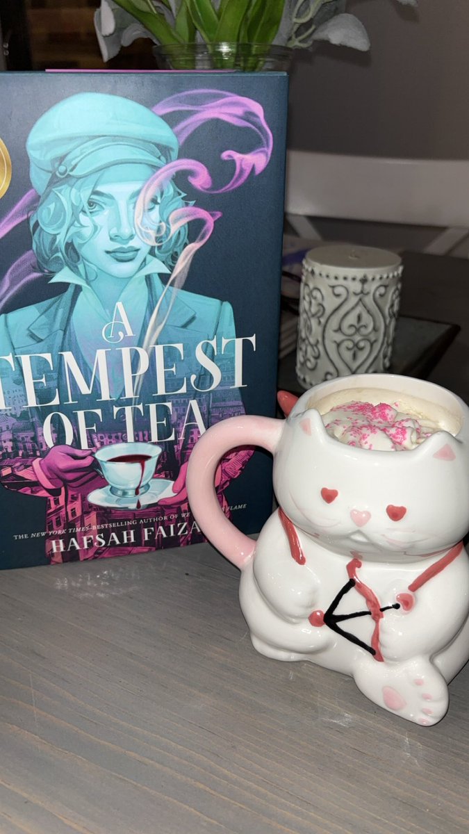 It’s me, a book, and my new mug against the world rn 🥰