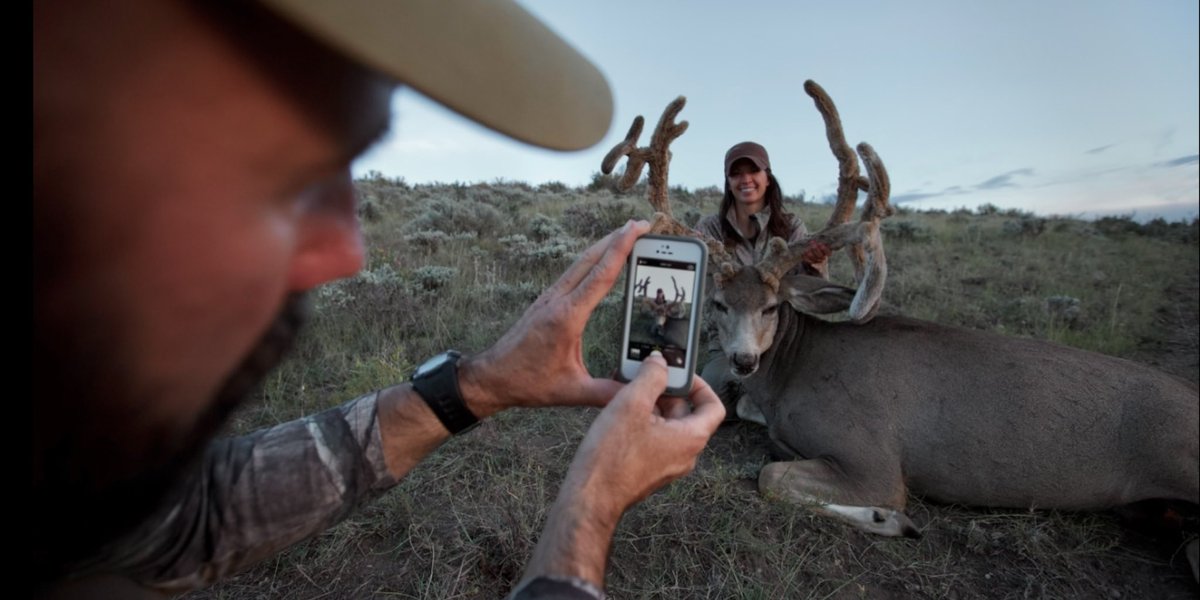Celebrating #ThrowbackThursday via the great Iphone4! 😂 oh wait a giant buck and a beautiful lady is what I’m talking about❤️ #throwback #muledeer #muledeerhunting #smiles #velvet