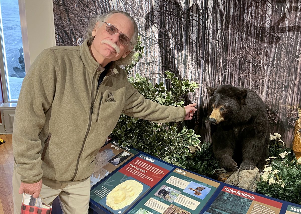 Worldsoldestham's tweet photo. Museum friend and supporter Melvin "Bear" Overton stopped by to point out his favorite spot in the museum this week! #twobears #museumfun https://t.co/Wh6HBz53Hk