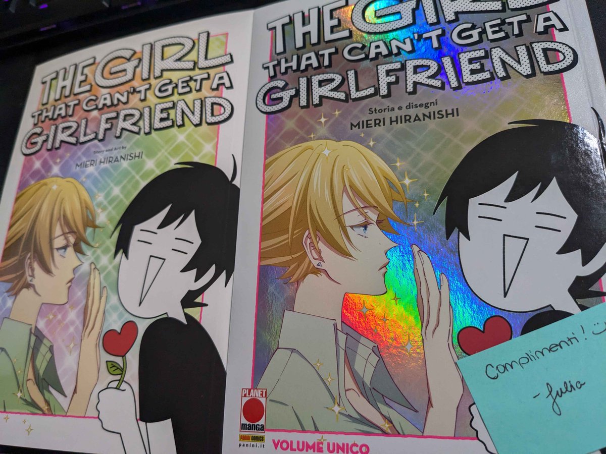 My editor at <a href="/VIZMedia/">VIZ Media</a> sent me the Italian version of The Girl That Can't Get a Girlfriend and IT'S SO SHINY COMPARED TO THE ORIGINAL MANGA, IT LOOKS LIKE A YUGIOH CARD LMAOOOO 🌈🤪🌈

Grazie to <a href="/PaniniComicsIT/">Panini Comics Italia</a> for distributing the Italian version of this manga!! 🫶🇮🇹 Beautiful!
