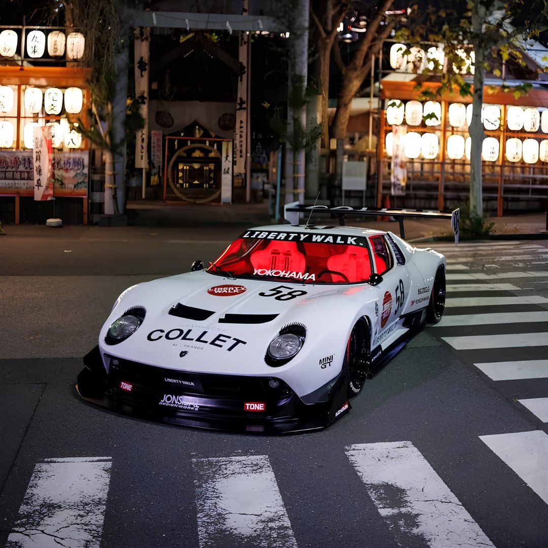 ShiftMoto's tweet photo. Liberty Walk's blazoned Lamborghini Miura glinting the streets of tokyo. It’s a real, V12-powered, multi-million-dollar Lamborghini. It does have deep-dish wheels, canards galore, and a super gigantic rear wing. #tokyoautosalon2025 #Lamborghini #Libertywalk https://t.co/JTuWWrEdEj