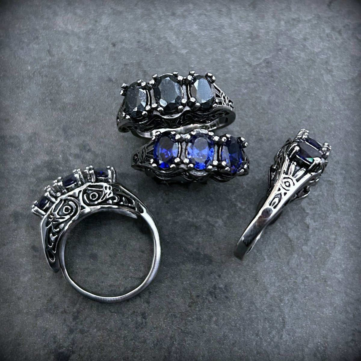 EvilPawn's tweet photo. Question of the Day… Blue or Grey? 

Drop a heart
💙 or 🩶

The All Seeing Eye Ring Limited Release is up! 
Iolite or Hematite? 
Happy Week’s End! https://t.co/I40baEp5nT