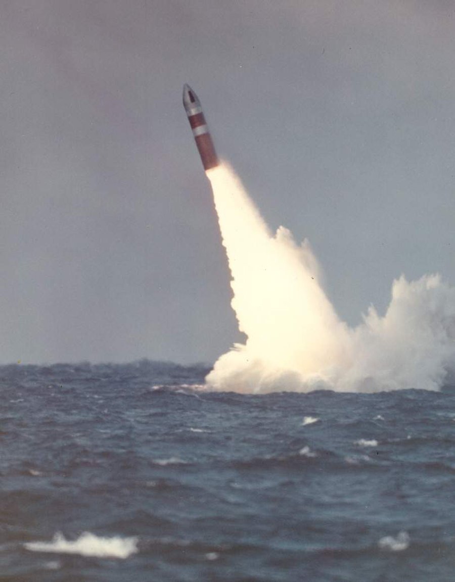 A starboard view of the nuclear-powered strategic missile submarine Lewis &amp; Clark (SSBN-644) underway, getting down to the business she was built for—silent, stealthy, and always ready. On December 18, 1972, she proved it with the submerged launch of a Poseidon missile.

To all
