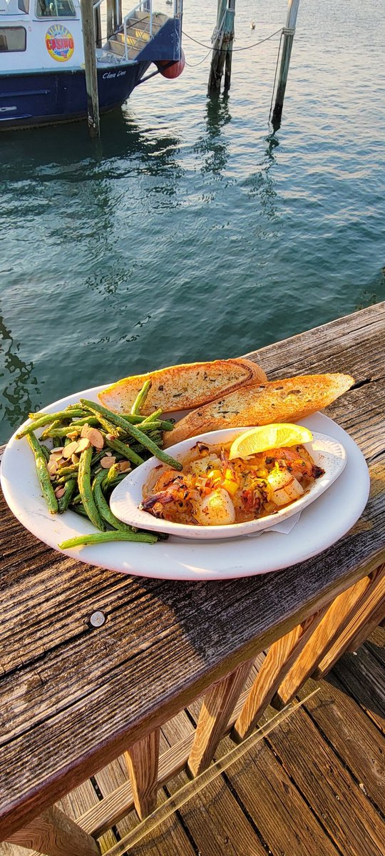 Monthly special alert! Enjoy our brand new seafood bake, baked to a golden brown and featuring fresh sea scallops, jumbo shrimp and our savory chili-lime sauce, served with garlic bread, a side and salad! Available all February long... at Rusty's at the Port!!  #rustysseafood