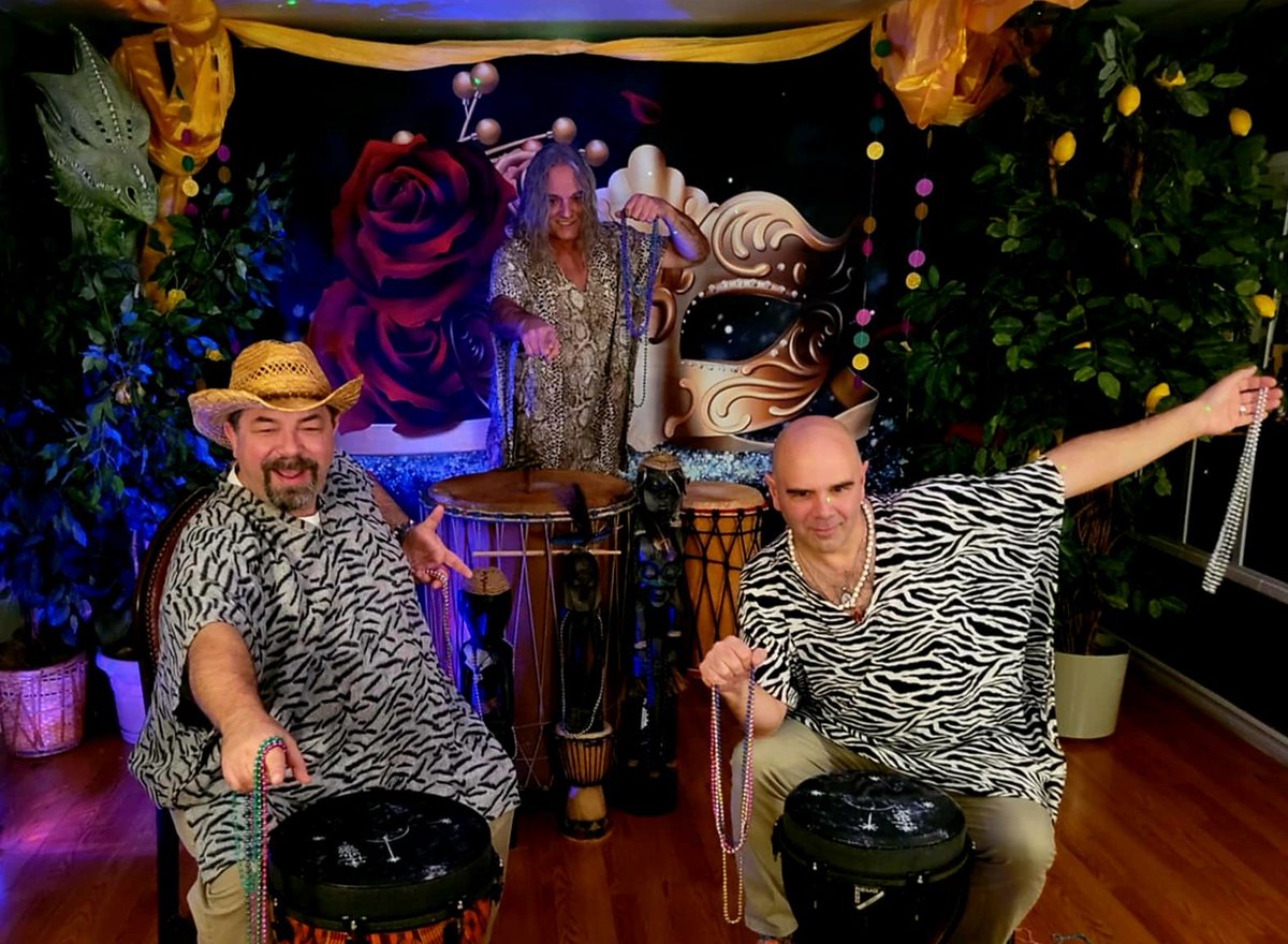 Tonight's WitchCon drum squad! Floating high above Niagara's mist on our magic balcony, we're ready for three nights of Carnival celebrations in the astral!🪘 🥳🪅 🎊 🍺