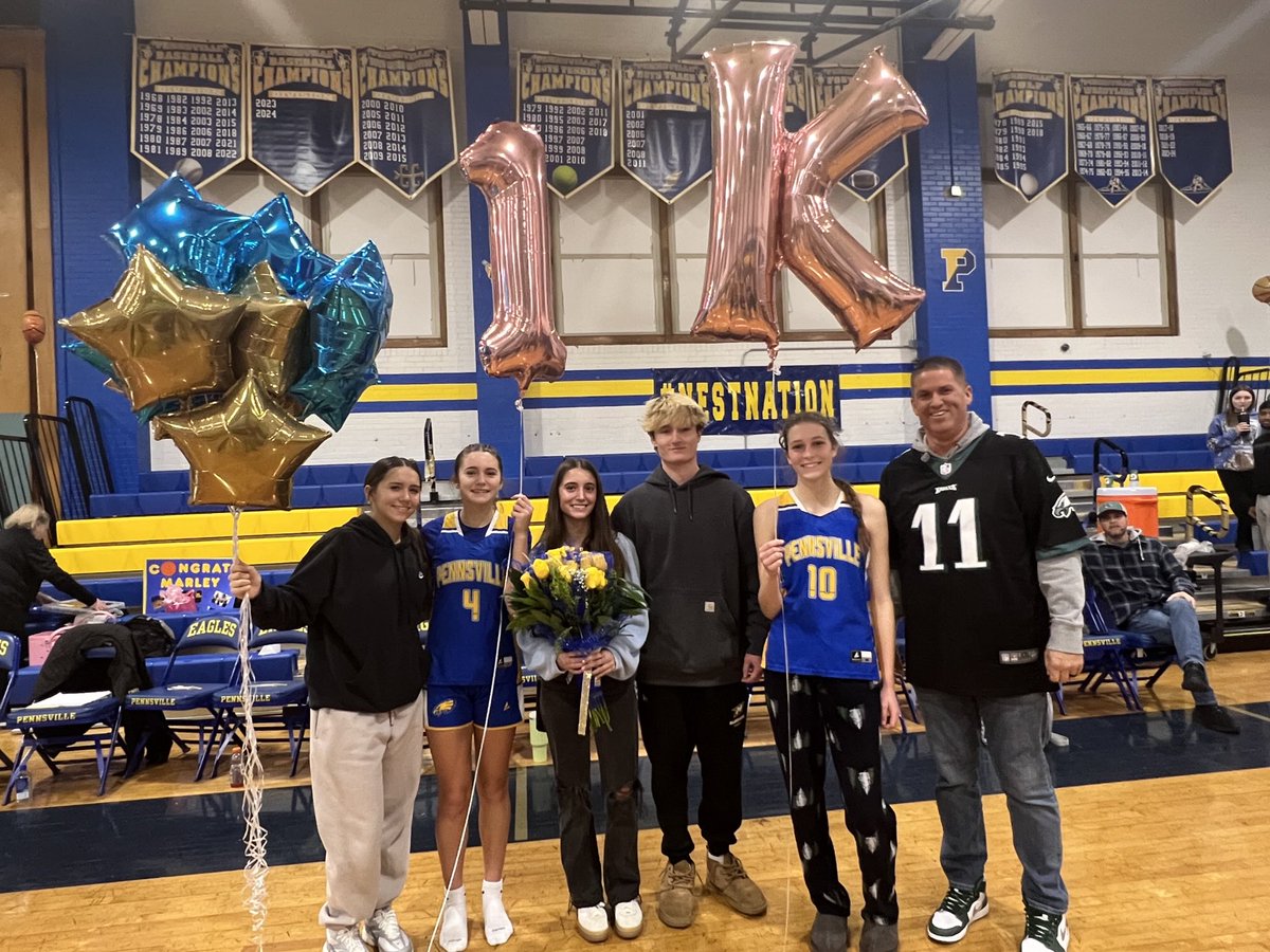 There’s a lot of points in this photo - 7,108 if you’re counting. Woodstown’s Talia Battavio (L) and (L to R) Pennsville’s Ryane Wood, Luke Wood, Nora Ausland and AD Jamy Thomas - all 1000-point scorers - were on hand to welcome Pennsville’s Marley Wood (4) to the club Friday.