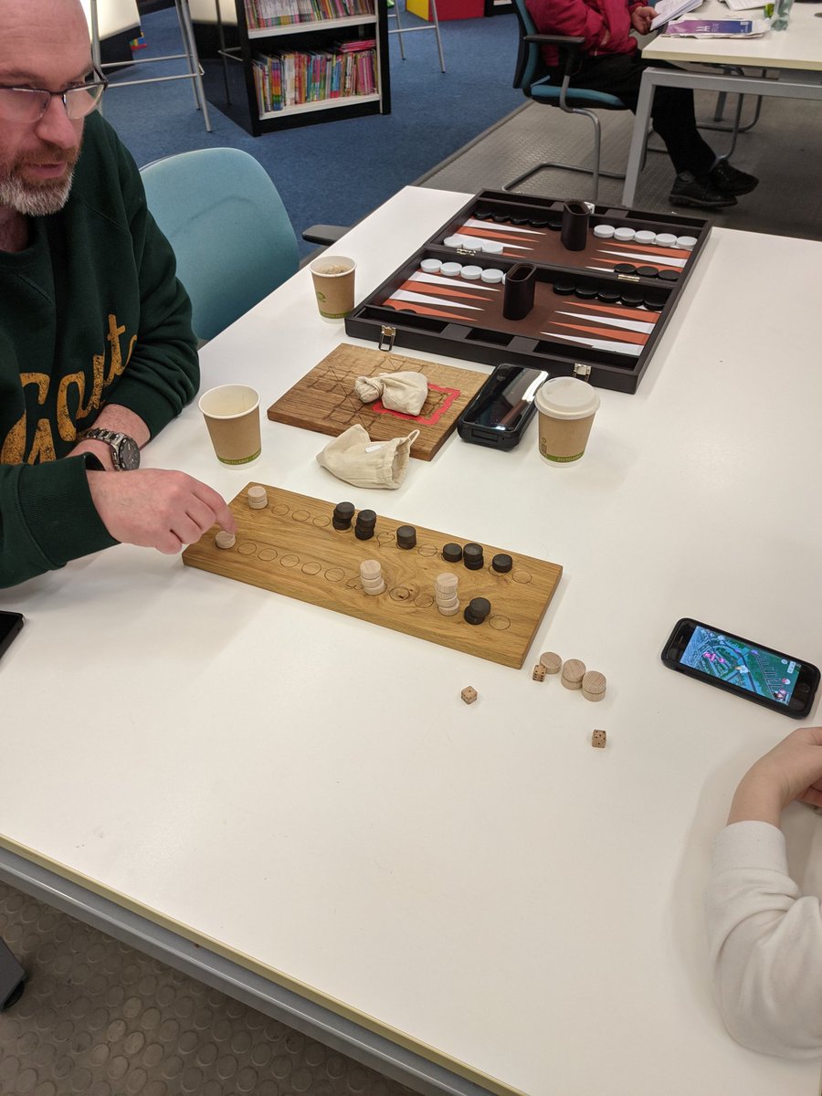 CCaerphilly's tweet photo. Well then #bargoed 

The #stemhour is in full swing @BargoedLib 

Started with one of our favourites #backgammon &amp; #alea a #ancientgame version of backgammon!

Our adult player is getting slaughtered by our younger player

100% free thanks to @BargoedTC funding!

@CaerphillyLibs https://t.co/dAiIQB0nOM