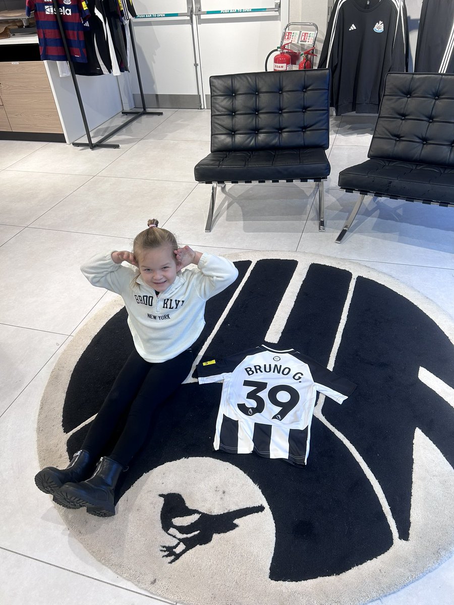 carlson2702's tweet photo. Ella wanted a @brunoog97 shirt ready for the cup final. Sneaky photo bomb from the one and only @alanshearer #NUFC @NUFC https://t.co/G9EupiUK2X