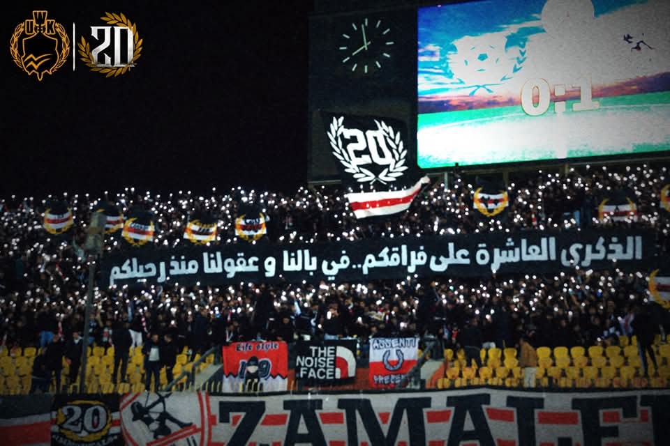 White07Knights's tweet photo. "الذكرى العاشرة على فراقكم، في بالنا وعقولنا منذ رحيلكم."

تَمُر السنوات ويمضي الوقت، وتَظل ذكرى العشرين داخل قلوبنا، لن ننساهُم أبدًا، ولن ننسى مَن كانوا هُنا معنا، يهتفون، ويعلو بالأهازيج والهتافات بإسم نادي الزمالك العظيم.

اليوم وبعد تطهير نادينا من "المُختل" الذي لم ولن ننسى دوره الرئيسي في فقدان أبطالنا العشرين، وبعد مرور عشر سنوات كاملة، نُحيي ذكراهُم من داخل التالتة يمين، هذا المكان الذي فقدوا حياتهُم وهُم على أعتاب الدخول له ومؤازر�� الزمالك من داخل المدرجات كَمَا أرادوا دائمًا.

وكَمَا طالبنا سابقًا والآن نُكررها؛
بضرورة تكريم العشرين داخل نادي الزمالك بعمل نصب تذكاري لهُم، ووضع رقم عشرين على الزيّ الرسمي لكل الفرق الجماعية داخل النادي، وهذا أقل ما نقدمه لهُم، ولذكراهُم الطاهرة طوال الوقت.

لن ننساكُم أبدًا، وسَتظل أصواتكُم الأخيرة أمام وداخل الممر الملعون في أذهاننا إلى الأبد، وسَتظل ذكراكُم أنقى وأطهر فصول هذه القصة، وسبب صمود العائلة إلى الآن.

"عشرون رمز الوفاء، نحتسبهم من الشهدا ء"