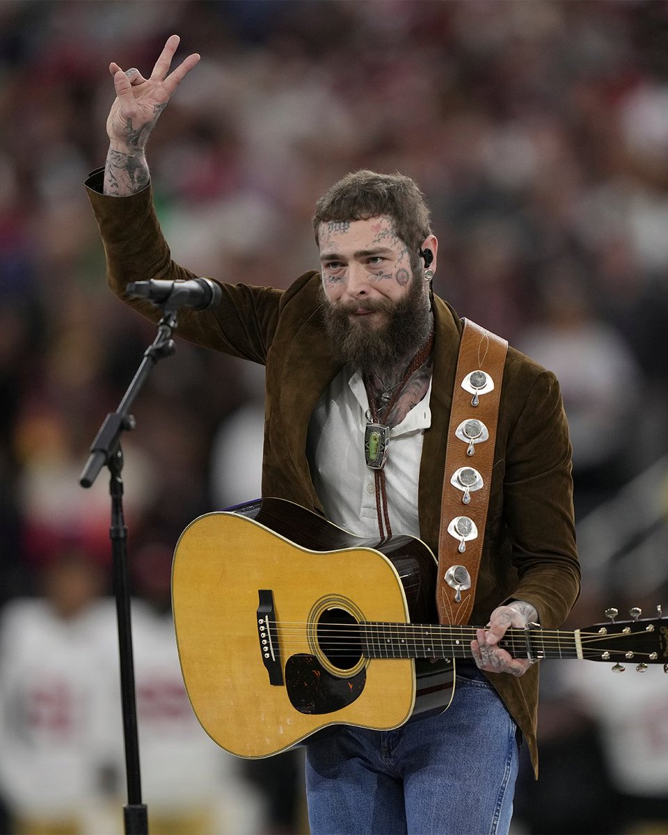 NFL's tweet photo. Less than 24 hours until @PostMalone performs at YouTube Tailgate!

Watch him perform LIVE at #SBLIX streaming on @youtube and listen on iHeart at 4pm ET on 2/9 🤠 https://t.co/BqZLVptmKa