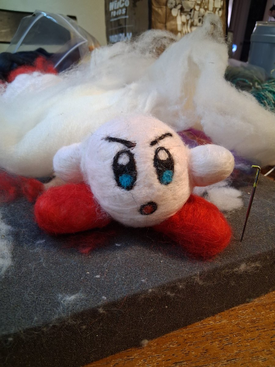 Fresh from the felting pad! Kirby is in an action stance, but if he was to hold something, what would it be? #felting #needlefelting #Kirby #fiberart