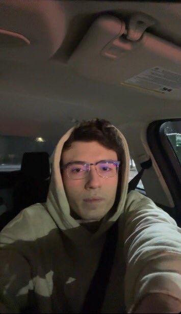 He has short stubby arms, look at him try to reach the phone