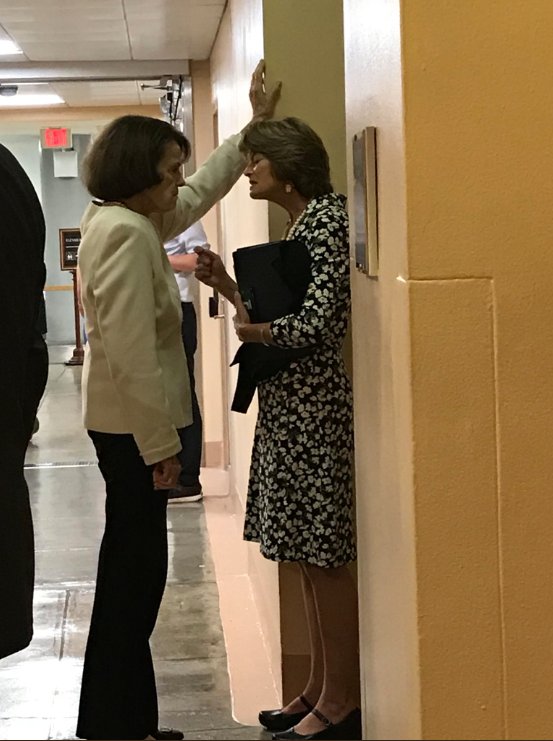 Do you see how Diane Feinstein is cornering Lisa Murkowski?

Look at the evil and hatred in her face.

Do you understand how these politicians are controlled?

What did Feinstein have on Murkowski?

Most of these politicians are not taking orders from humans.