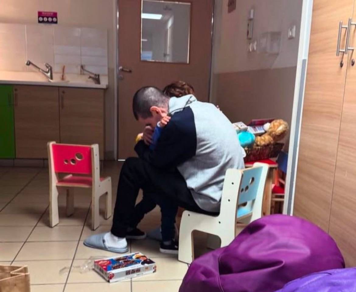 After over 490 days, Or’s son is finally embraced by his father. This is the first hug he has received by a parent in over 490 days.