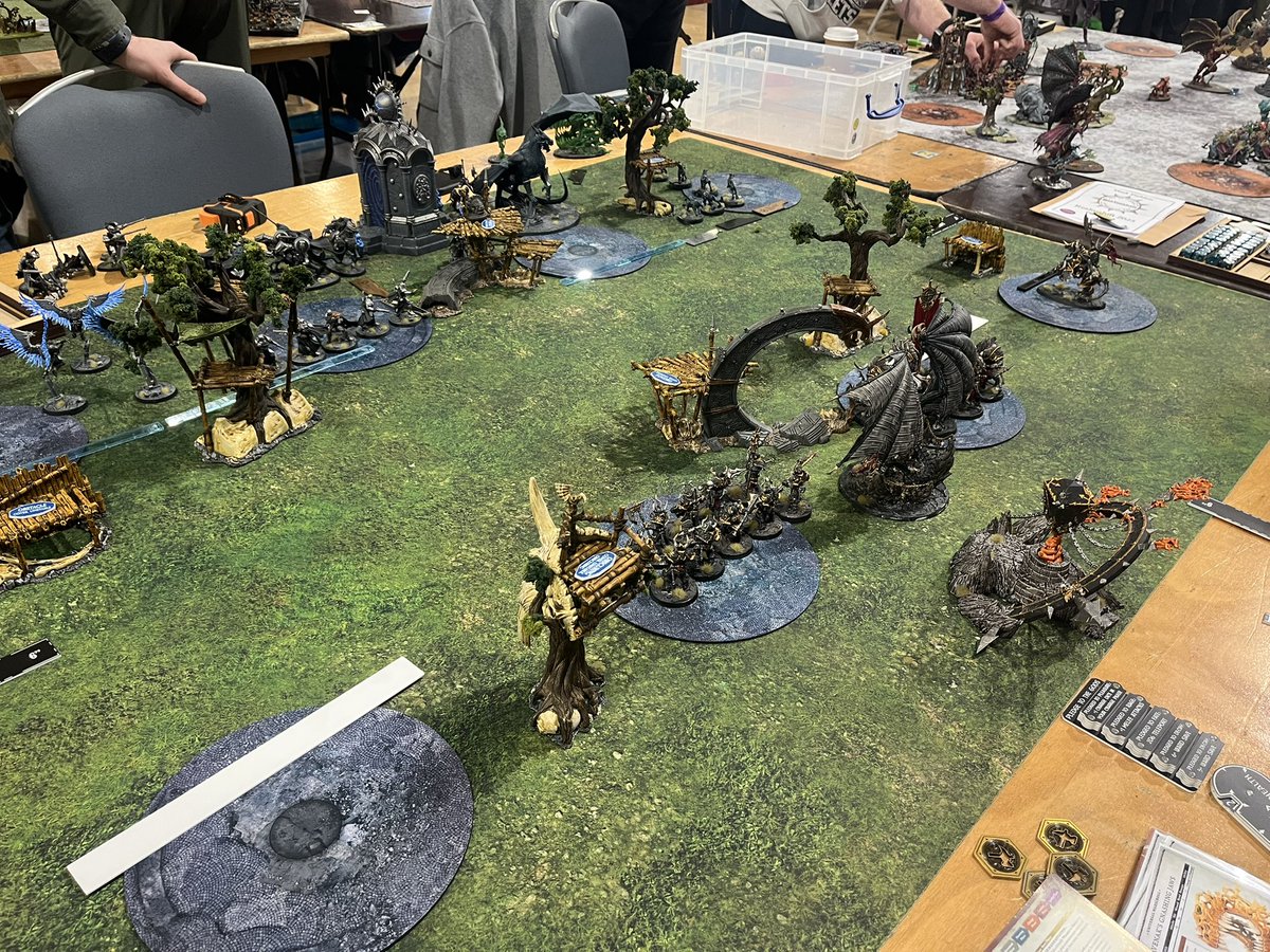 Table 4 has Slaves to Darkness vs Stormcast Eternals.
