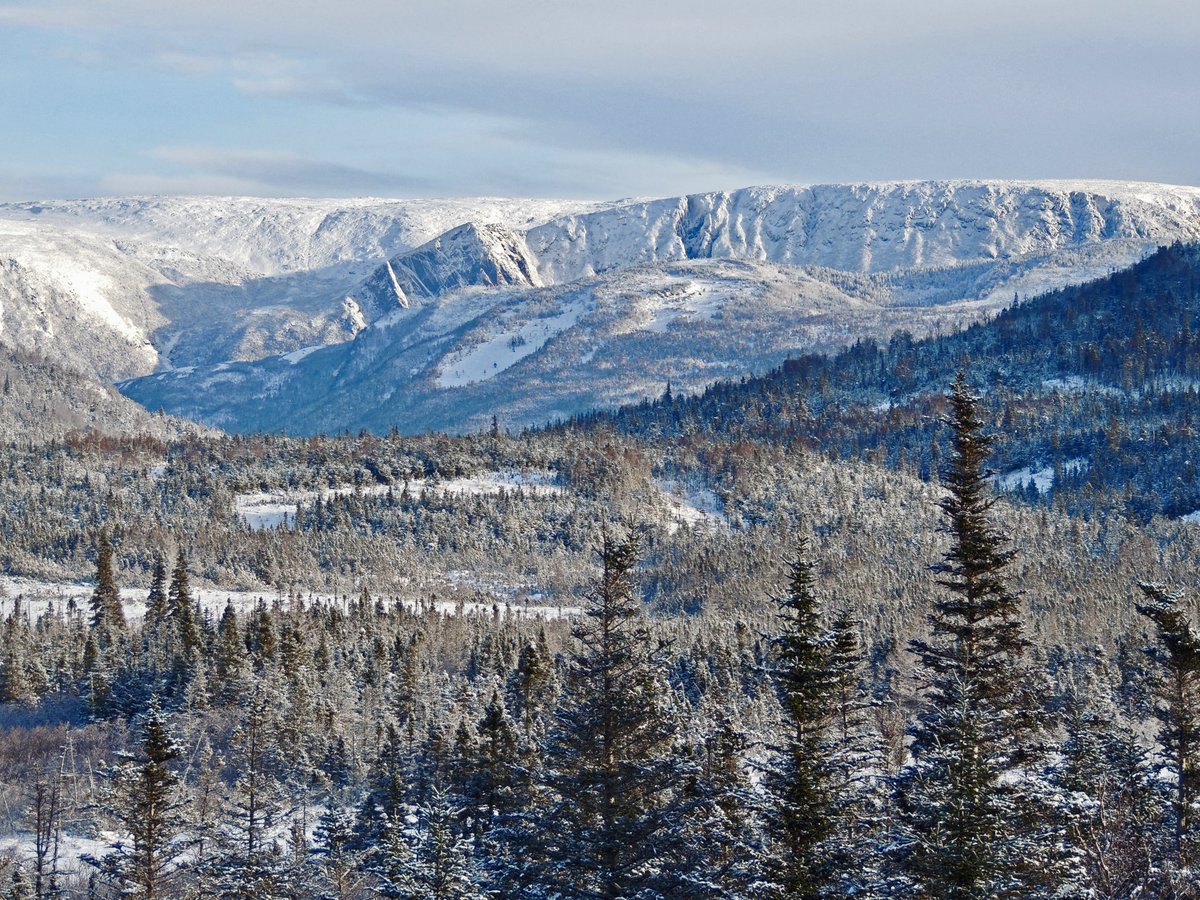 A view taken in the mountains around here. It is always so beautiful in these mountains on a sunny day. Years ago we would have been on our snowmobiles and heading up there which we often did on days just like this.