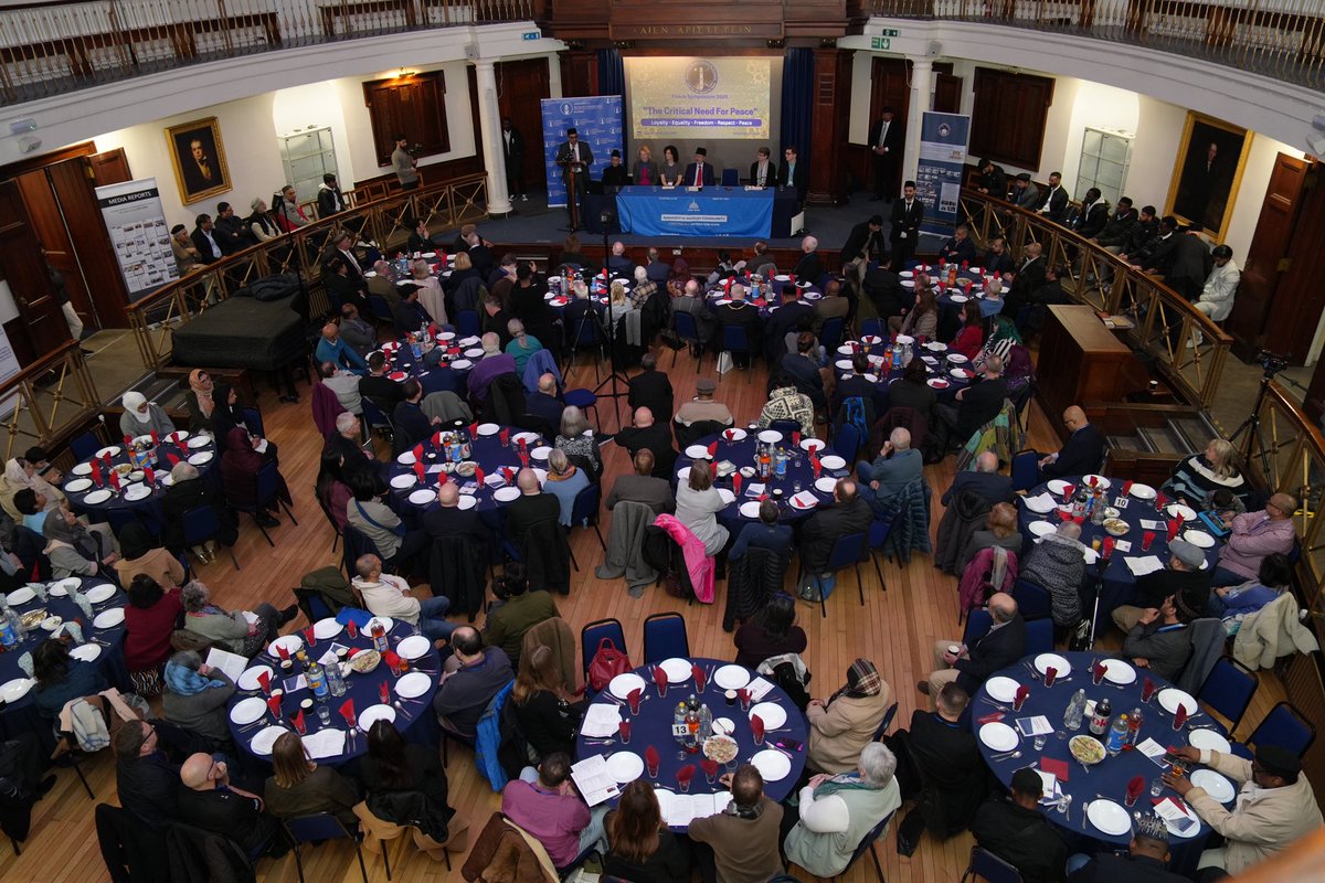 A video presentation giving an Introduction of the Ahmadiyya Muslim Community is being played for the guests at the #PeaceSymposiumScotland