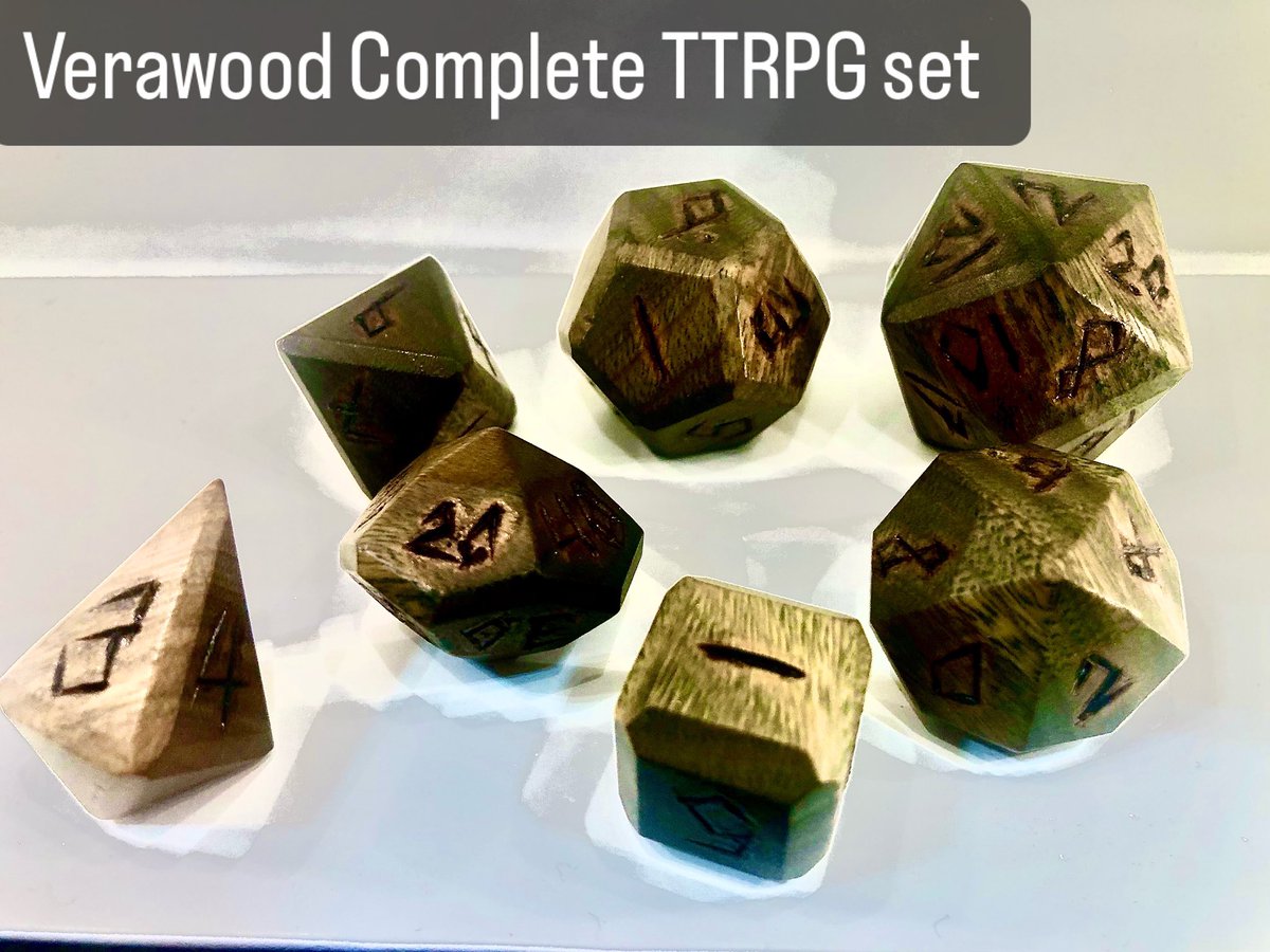 DruidCraft_Wood's tweet photo. @sabrinateenlich Hello digital lands of wonder! 

I craft wooden dice. Yet mine are not made by a computer guided CNC. Mine are hand-shaped using a faceting arm, like a jeweler.  Each die is finished at 1000 grit, producing a scratch-less shine. 

Commission one here:
https://t.co/ZcN8iH977L https://t.co/yx2IbvaEFt