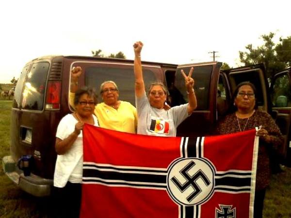 asdza_tlehonaei's tweet image. I assure you Native people been doing this since facism been a thing.
Images below are pictures of Native people posing with captured N*zi flags ✊🏽🪶