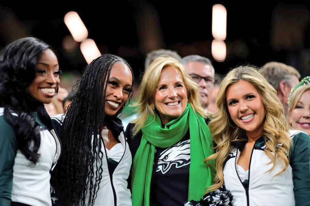 Philadelphia Eagles Cheerleader Tamia Casey (L) from Lincoln University PA pic with Jill Biden at the Super Bowl