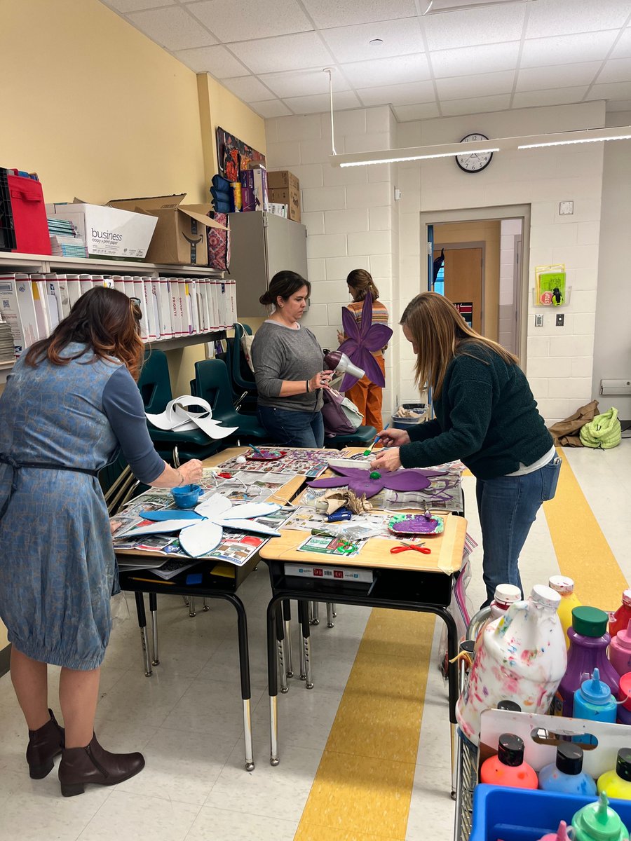 Morris Jeff elementary school teachers worked together this week to make Mardi Gras flowers for their classrooms. 🌸