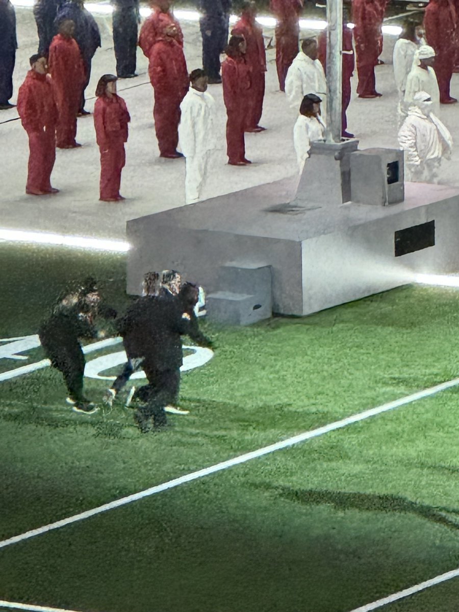 A man with the Palestinian flag got onto the field at the Superdome during halftime but was tackled by security. White House staff and reporters were already hustling to the motorcade at the time. Photos shared with me by an Iowan in the crowd.