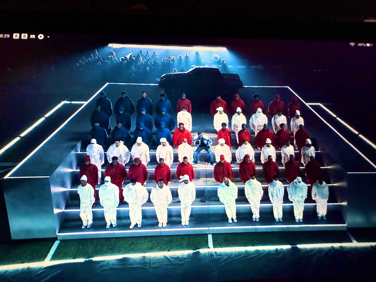 moorehn's tweet image. The flag formation, the simulated Nazi salutes, the walk around the prison yard, the goosestepping...it was a really finely wrought commentary on the current state of US fascism, i thought.