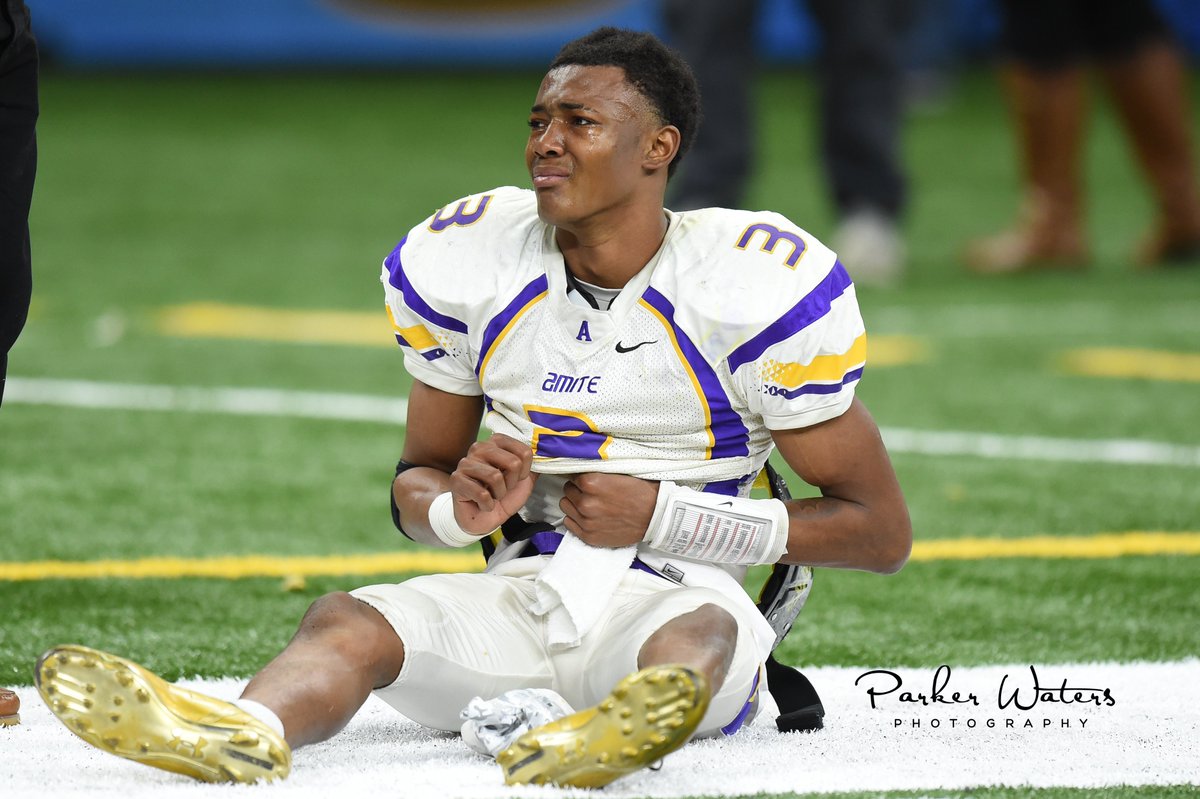 A dejected and tearful DeVonta Smith sits on the floor of the Superdome following a 40-36 loss to Lutcher in the LHSAA Class 3A State Championship (12/10/2016) in his senior year of high school. DeVonta would go on to win two National Championships at Alabama, the Heisman Trophy