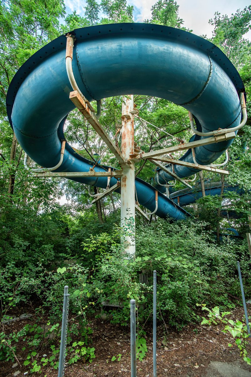 A water slide slowly being reclaimed by Mother Nature at an abandoned water park near Flint, Michigan.