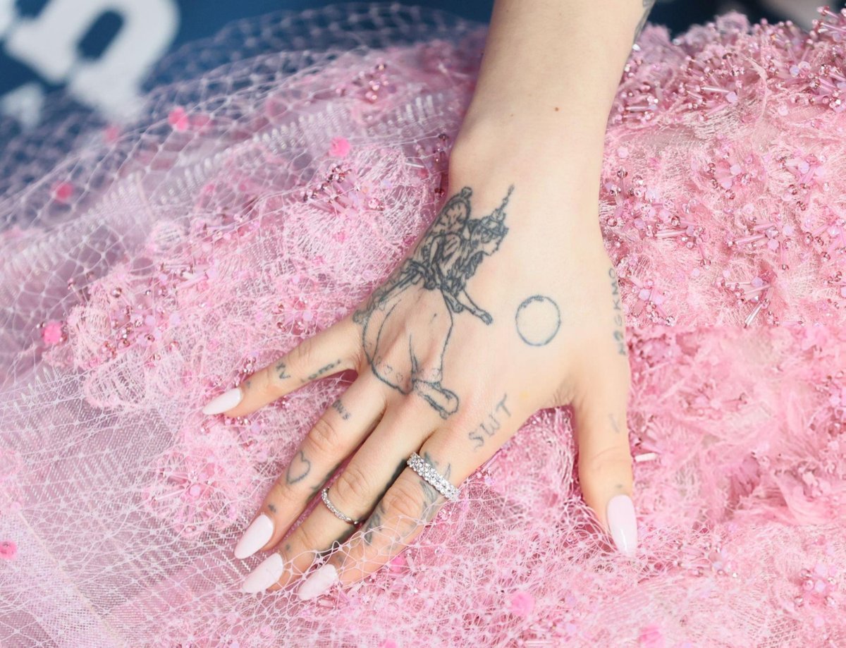 bwitched's tweet photo. ariana's glinda tattoo🥹 https://t.co/o5jFCJqeC7