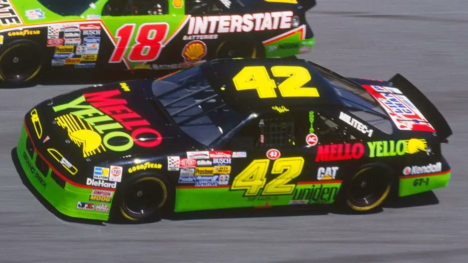 RetroCoast's tweet image. The 1990 film Days of Thunder was set to be another Tom Cruise blockbuster, and Coca-Cola wanted its logo on the race car.
But a junior Coke exec had an idea: why not promote Mello Yello, a forgotten brand owned by Coca Cola?
The iconic green-yellow car became movie history.